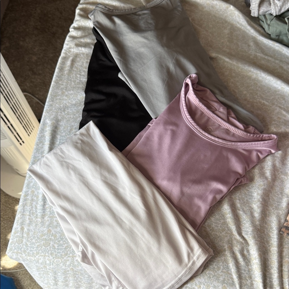 Set of Four Sleeveless Tops in Assorted Colors